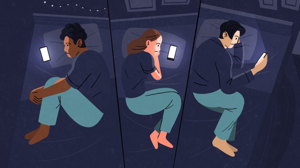 Three young people using their phones in bed – they look concerned at the glowing screens.
