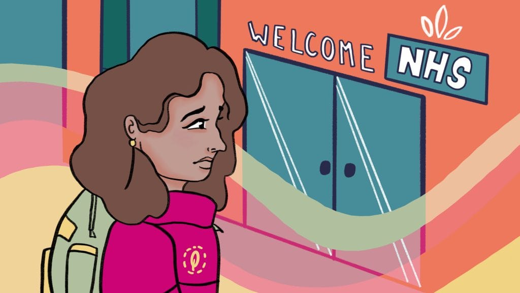 A woman waiting outside a healthcare facility with a "Welcome NHS" sign in the background, illustrating patient access to NHS services.