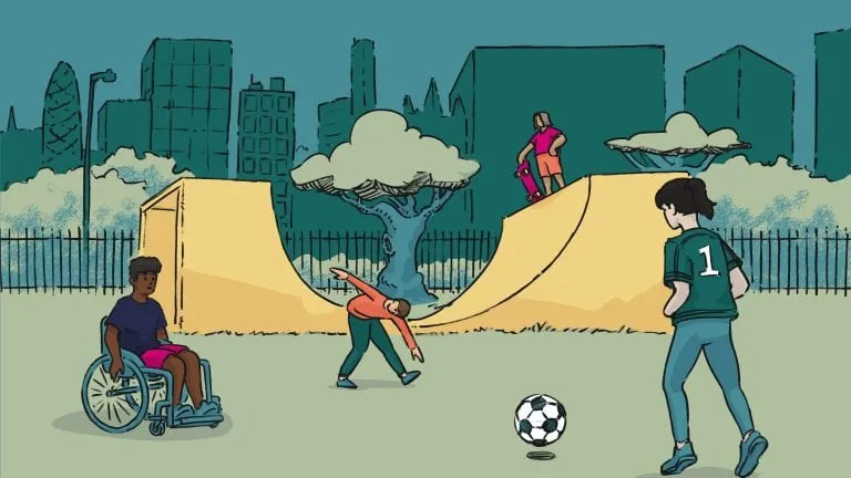 A wheelchair user and their friend playing football at a skate park with city buildings in the background. Someone is stretching and doing exercise in the background.