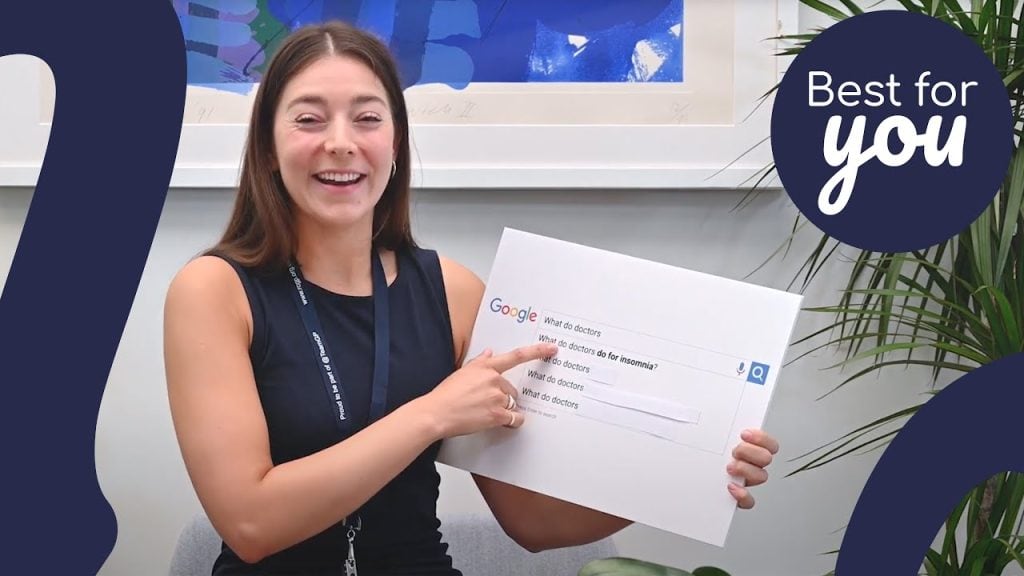 Google search for advice on anxiety and mental health, smiling woman in a professional setting.