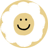 A cheerful, smiling face on a flower, representing happiness and positivity.